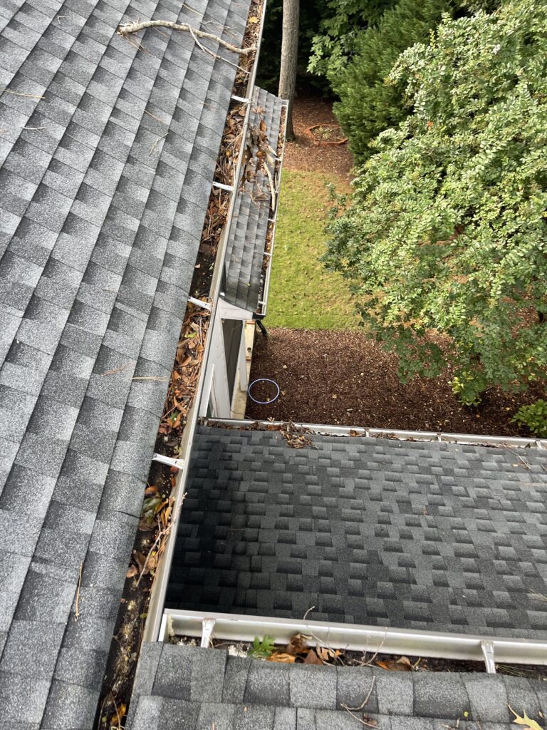 clogged gutters before gutter guard installation Atlanta